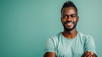 Wall Mural - Portrait of a Smiling Black Man with Arms Crossed