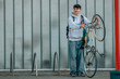 © carballo - urban scene of young man with vintage bicycle