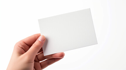 a left hand holding a plain business card