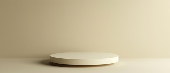 Wall Mural -  A round, white object sits atop a white table against a beige wall in an empty room