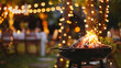 © SunPunjiStudio - Backyard BBQ Grill with Flames and Bokeh Lights.