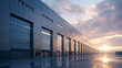 © Daniel - Modern Industrial Warehouse at Sunset With Reflective Surface and Dramatic Cloud Formation