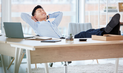 Poster - Relax, desk and businessman in office on break for finance project success with break in stock market. Corporate, smile and Asian financial analyst with rest for finished revenue report in workplace.