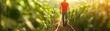 © Pual GotoMars - A person walking through a greenhouse, surrounded by vibrant plants, showcasing sustainable agricultural practices.