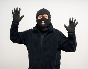 Wall Mural - Thief in uniform black jacket various pose on isolated background. The Robber terrorism criminal escapes with balaclava and crowbar entering a house for stealing Housebreak