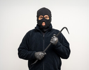 Wall Mural - Thief in uniform black jacket various pose on isolated background. The Robber terrorism criminal escapes with balaclava and crowbar entering a house for stealing Housebreak