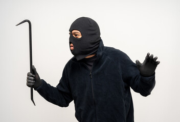 Wall Mural - Thief in uniform black jacket various pose on isolated background. The Robber terrorism criminal escapes with balaclava and crowbar entering a house for stealing Housebreak