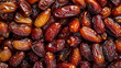 © Emmy Ljs - Close-up of dried date heap, sweet,brown, natural fruit snack.