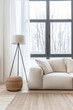 © JuanM - Property interiors decor composition with a standing lamp next to a large window on a minimalist living room.
