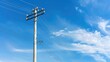 © TheWaterMeloonProjec - High voltage electric pole in blue sky with copy space for electricity energy content