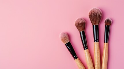 Sticker - Set of wooden cosmetic brushes for eyeshadow application on pink background