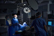 © Svitlana - Group of surgeons in operating room with surgical laparoscopy equipment