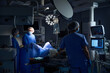 © Svitlana - Surgeons medical team performing surgery in operation theater at hospital