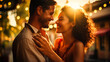 © Paula - Couple smiling at each other with festive lights at sunset