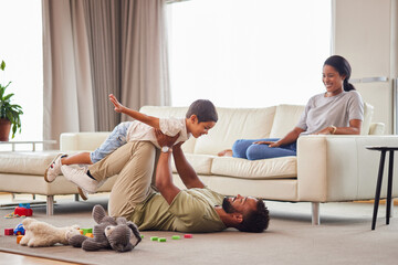 Wall Mural - Home, parents and child with airplane on floor for balance, freedom and bonding together in childhood. Happy, father and son with game by toys in living room for love, care and imagination of flight