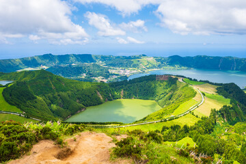 View of green water lake in volcano crater near Sete Cidades town, Sao Miguel island, Azores, Portugal