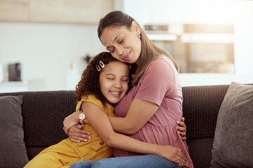 Poster - Hugging, sofa and child with mother for love, care and bonding together in home. Smile, connection and girl kid embracing single mom for relax in living room on weekend at house in Colombia.