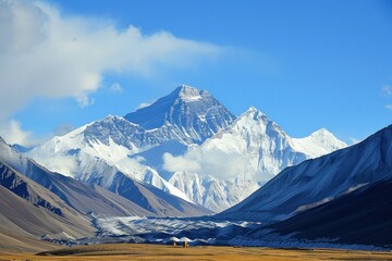 Beautiful winter landscape with frozen lake and snow covered shore. Beautiful snowy frozen mountains landscapes at cold winter. Snowy Mountain landscape with lake and snow-capped peaks.  