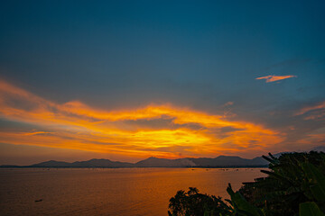 The beauty of the sky was mesmerizing in quite sunset..Stunning clouds changing form and color at sunset..Majestic sunset landscape Amazing light of nature..cloudscape background.