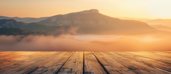 Poster - Morning sunrise on a mountain creates a serene backdrop for a shelf floor with soft mist perfect for a copy space image