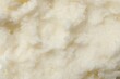 © New Africa - Natural shea butter as background, top view
