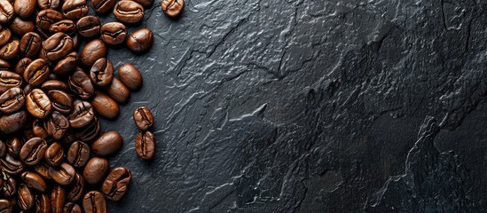 Aufkleber - Coffee beans arranged on a dark surface with copy space image available