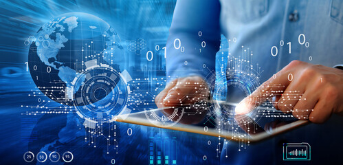 Internet of Things, digital transformation, and software technology development concept. Coding by a software engineer using an innovative technological interface on a laptop
