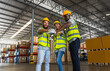 © Jack Tamrong - Diversity woman and men factory workers holding hands for successful teamwork in distribution warehouse