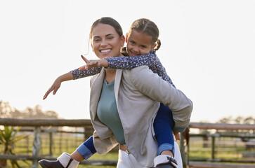 Poster - Piggyback, portrait and mother with child for love, security and relationship on ranch. Woman, daughter and happy on farm for wellness, development or playing together for trust in countryside