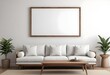 © Sharif54 - Minimalist living room with a large white sofa, wooden coffee table, and a blank framed wall art