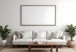 © Sharif54 - Minimalist living room with a large white sofa, wooden coffee table, and a blank framed wall art