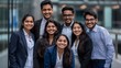 © movinglines.studio - Group of Indian Professional Business Students Smiling Outside School Building