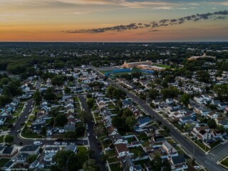 Wall Mural - Aerial view of a residential neighborhood in Valley Stream at sunset in Long Island, New York, USA