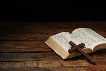 Wall Mural - Bible and cross on wooden table, space for text. Religion of Christianity