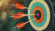 © auc - close-up of arrows hitting the bullseye of a colorful target with a blurred green background, symbolic of success, accuracy, and goal achievement.