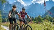 © somneuk - active senior couple on a mountain bike tour in the Julian Alps above Kranska Gora in Slovenia