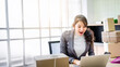 © totojang1977 - Young attractive Asian businesswoman working business entrepreneur SME at home with internet online. Young woman feel happy and joy to checking order with doing business online.