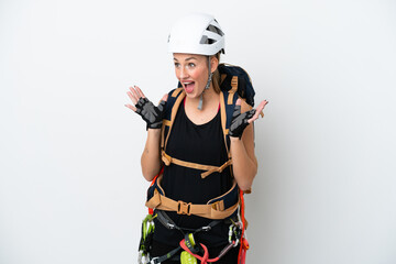 Wall Mural - Young caucasian rock climber woman isolated on white background with surprise facial expression