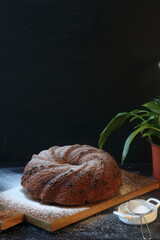 Wall Mural - Bundt cake, pound cake on  a black background