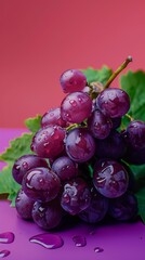 Wall Mural - red grapes on a table