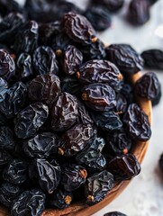 Wall Mural - small dried black raisins