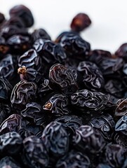 Wall Mural - small dried black raisins