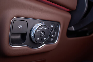 Wall Mural - A detailed view of the advanced climate control system on a modern vehicles dashboard interior