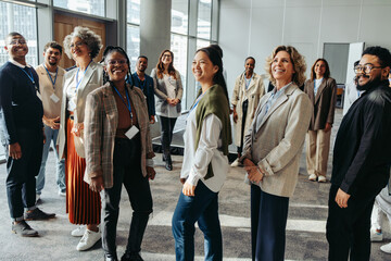 Wall Mural - audience at a business seminar in the workplace looking happy and engaged