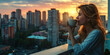 © Lila Patel - A woman enjoying a cup of coffee on her balcony, overlooking a bustling city skyline.