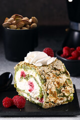 Sticker - meringue roll with pistachios and fresh raspberries