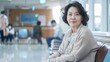 © Bold24 - portrait of a woman sitting comfortably in a modern hospital waiting room