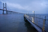 Rainy night image of the Vasco da Gama bridge from the Parque das Naçoes in Lisbon.