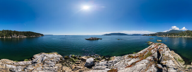 Wall Mural - Rocky Shore on West Coast of Pacific Ocean. Sunny Summer Day.