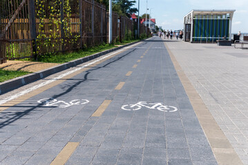 Wall Mural - Bicycle path sign on the sidewalk.